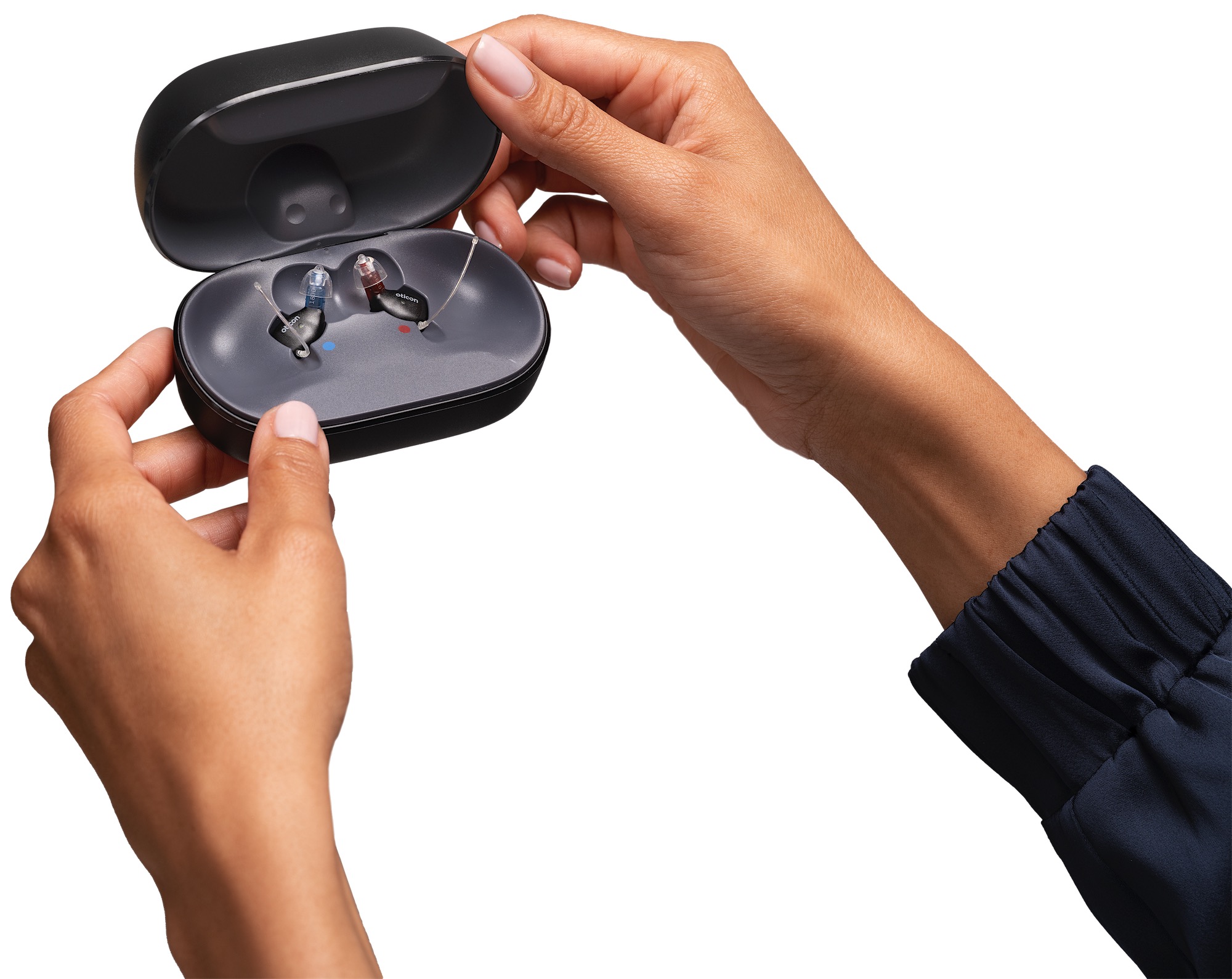 oticon_zeal_open_charger_with_product_in_hand_kc_25_24226